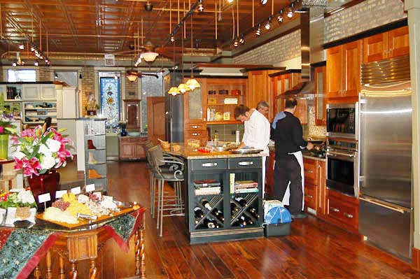 kitchen showroom with chefs cooking